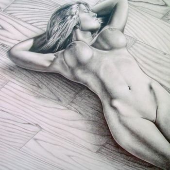 Nude female reclining on wooden floor