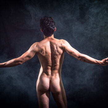Naked man's back. Study on male nude.