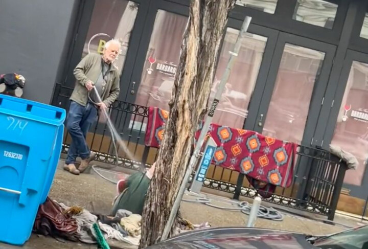 A San Francisco gallery owner is arrested and thrown in jail after he hosed down a homeless woman